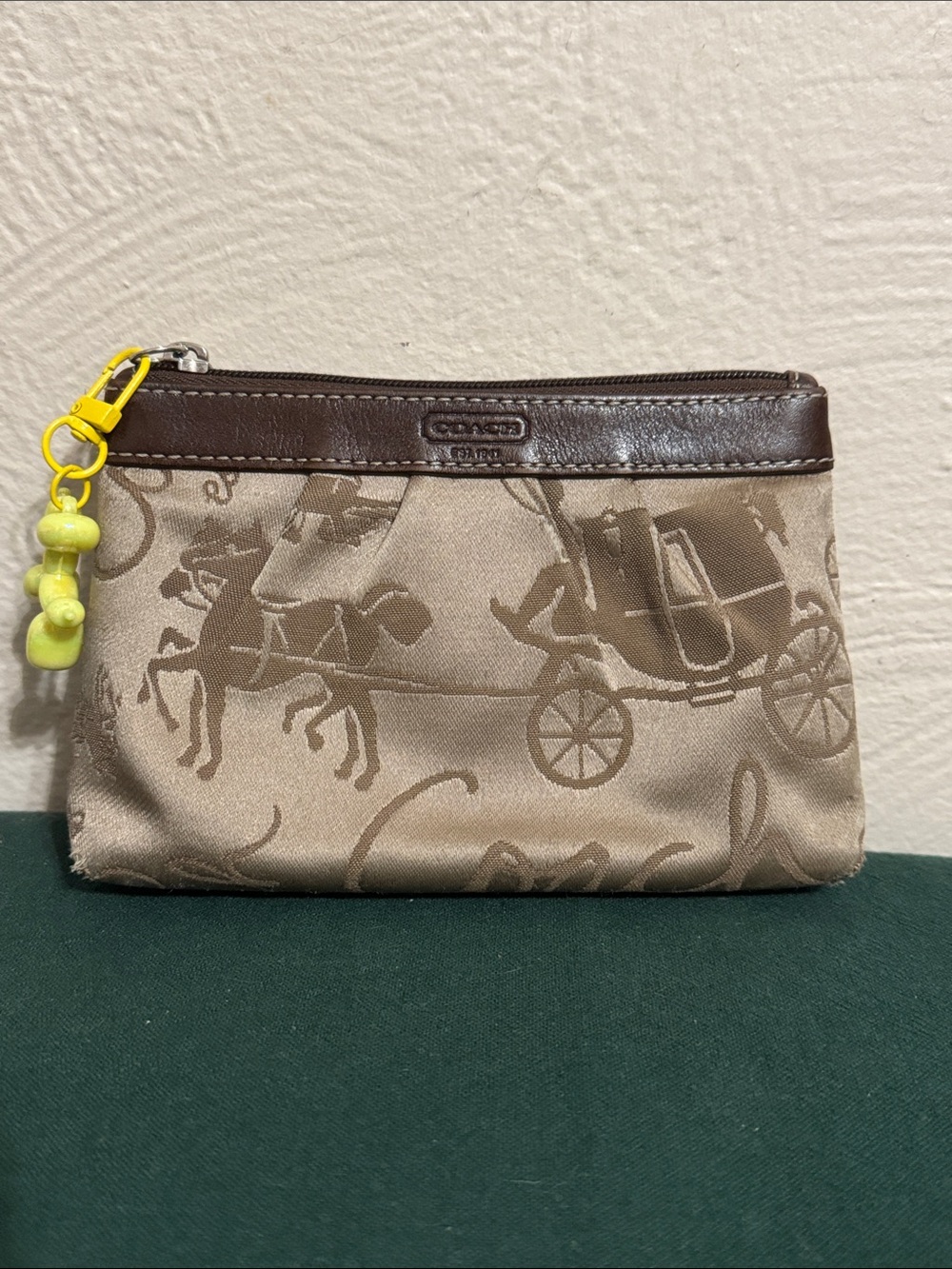 Coach Brown Signature Horse & Carriage Wristlet with Yellow Charm